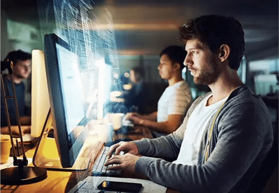 A man working on a computer about software engineering